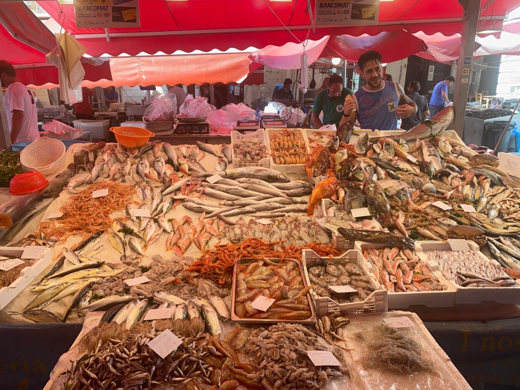 This image has an empty alt attribute; its file name is catania-fish-market.jpg