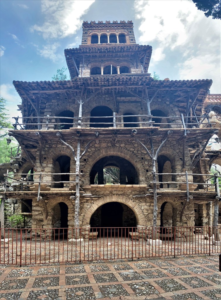 This image has an empty alt attribute; its file name is old-building-in-taormina-park-1.jpg