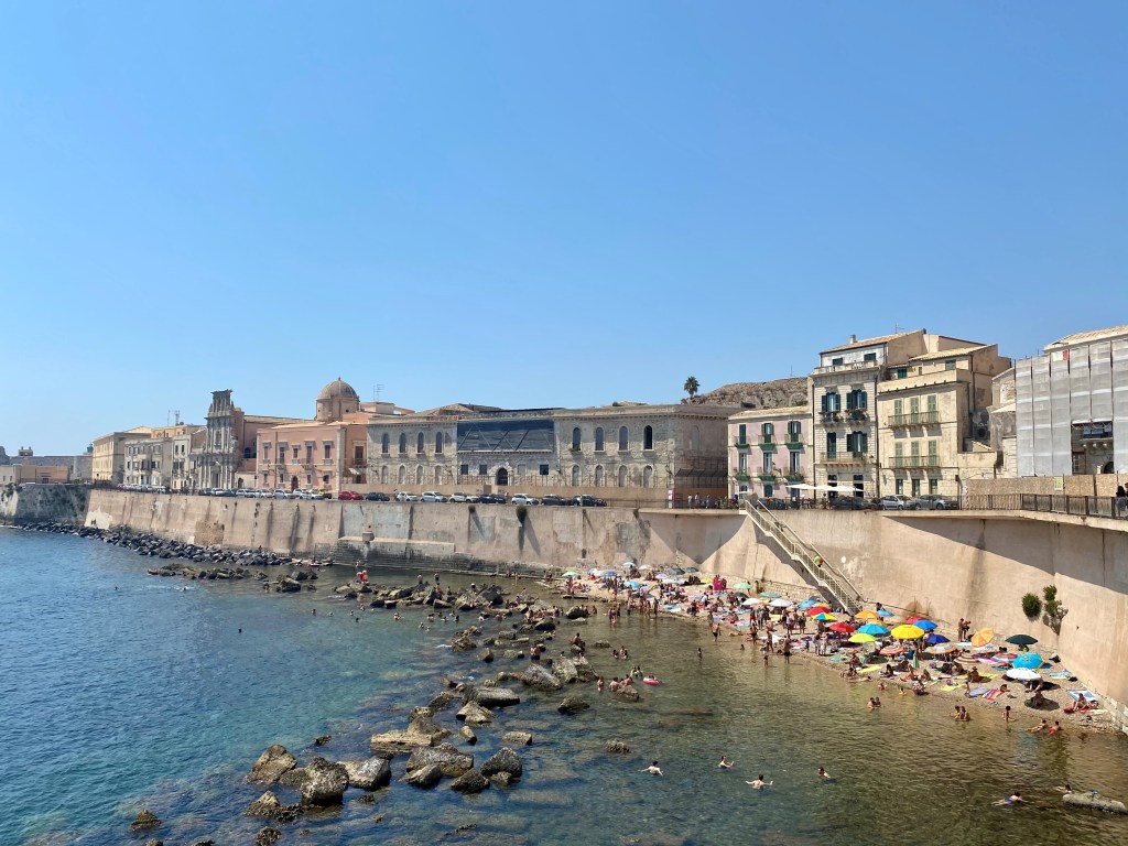 This image has an empty alt attribute; its file name is our-local-beach-in-syracuse.jpg