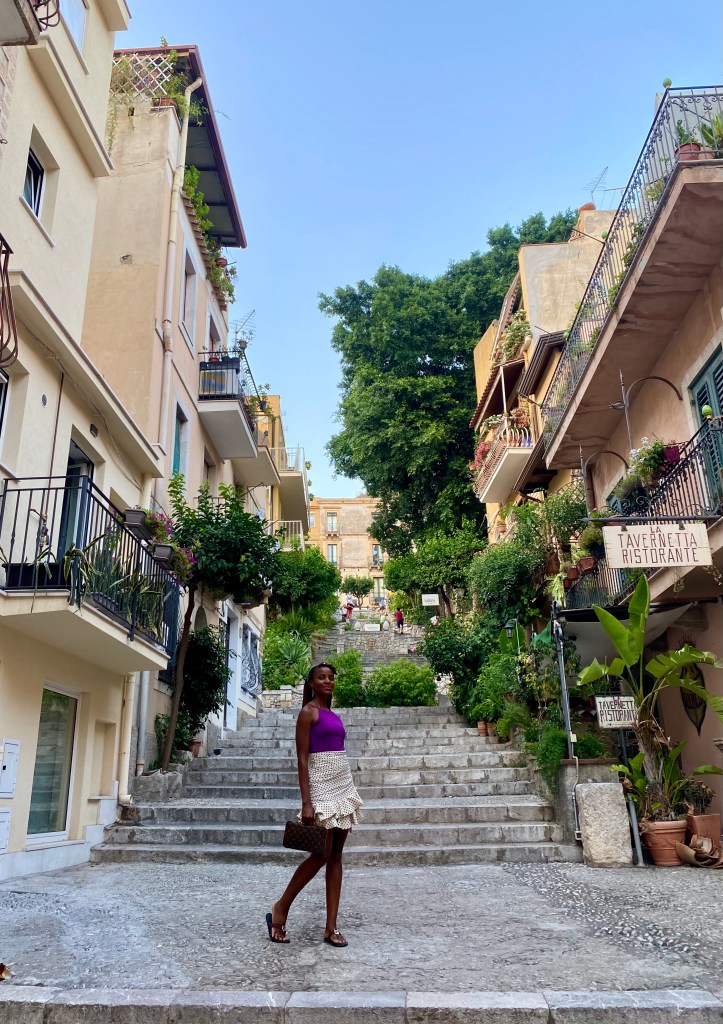 This image has an empty alt attribute; its file name is taormina-street-and-steps-1-1.jpg