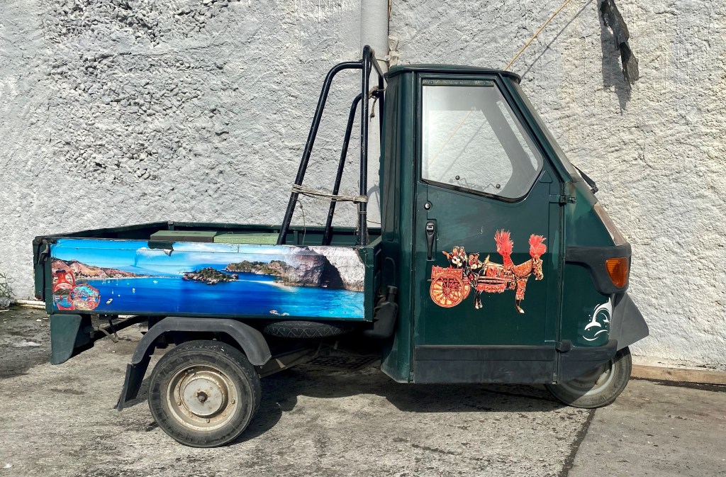 This image has an empty alt attribute; its file name is three-wheeler-2.jpg